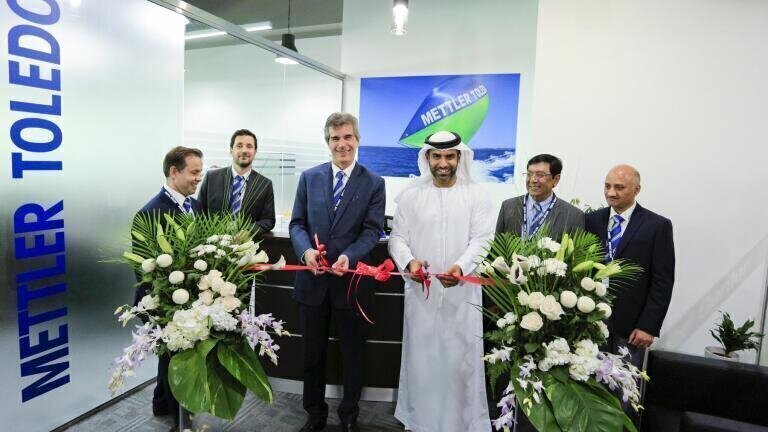 Marwan Abdulaziz Executive Director, Dubai Science Park (Right) and Jean-Claude Alder, General Manager of METTLER TOLEDO Sales International GmbH (left) at ribbon cutting ceremony of Mettler-Toledo Competence Centre at Dubai Science Park, Dubai. UAE.